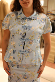 BLUSA FLOREALE IN RASO CON ALAMARI